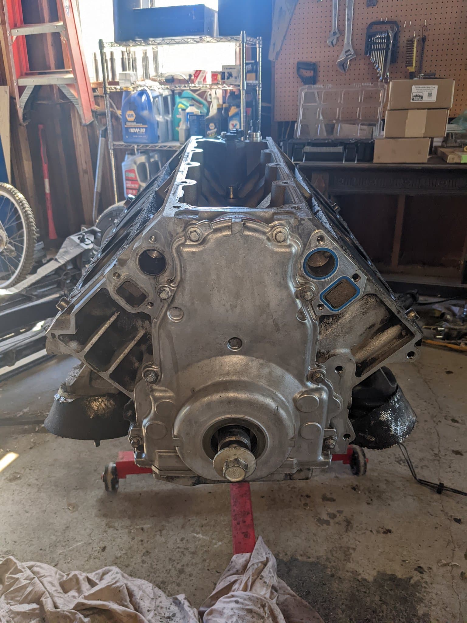 V8 engine block on a stand during rebuild