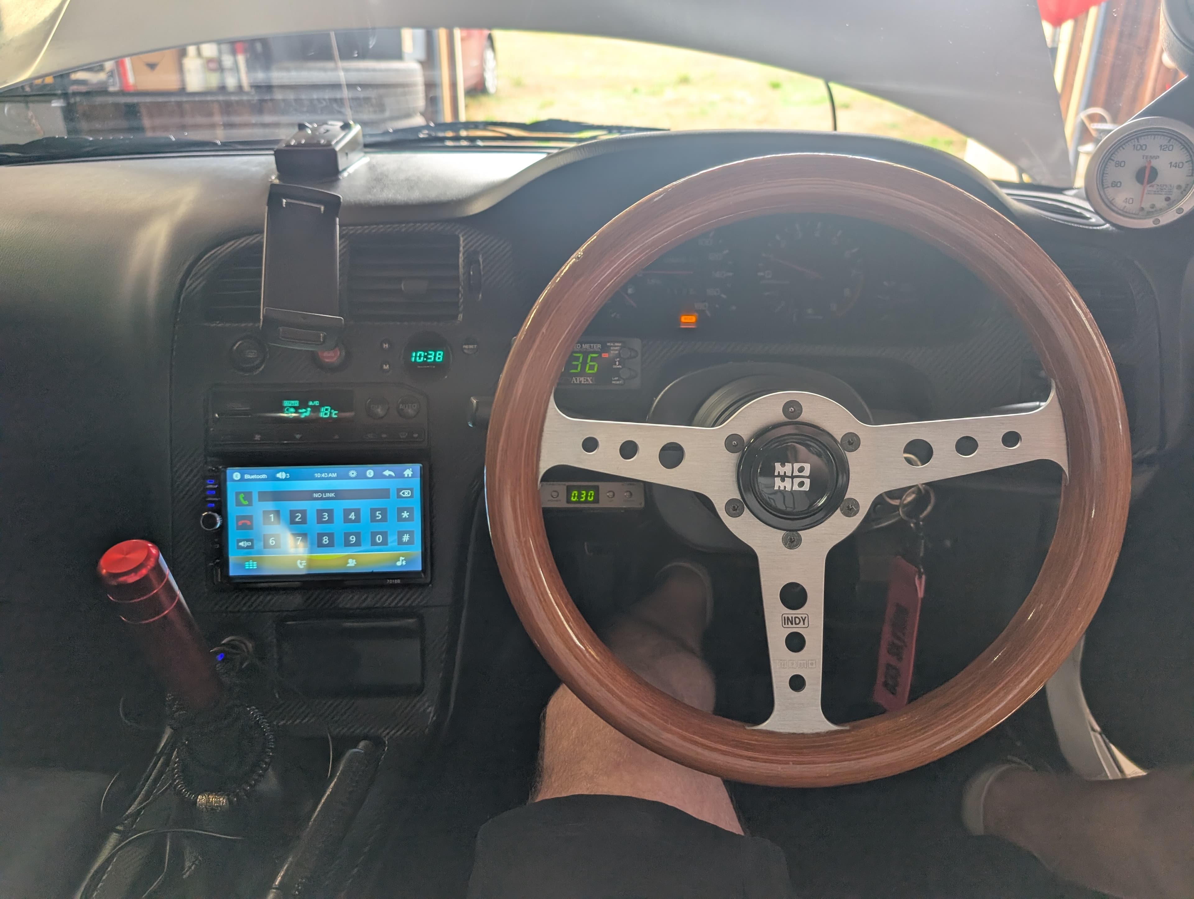 Custom MOMO steering wheel and carbon fiber dash