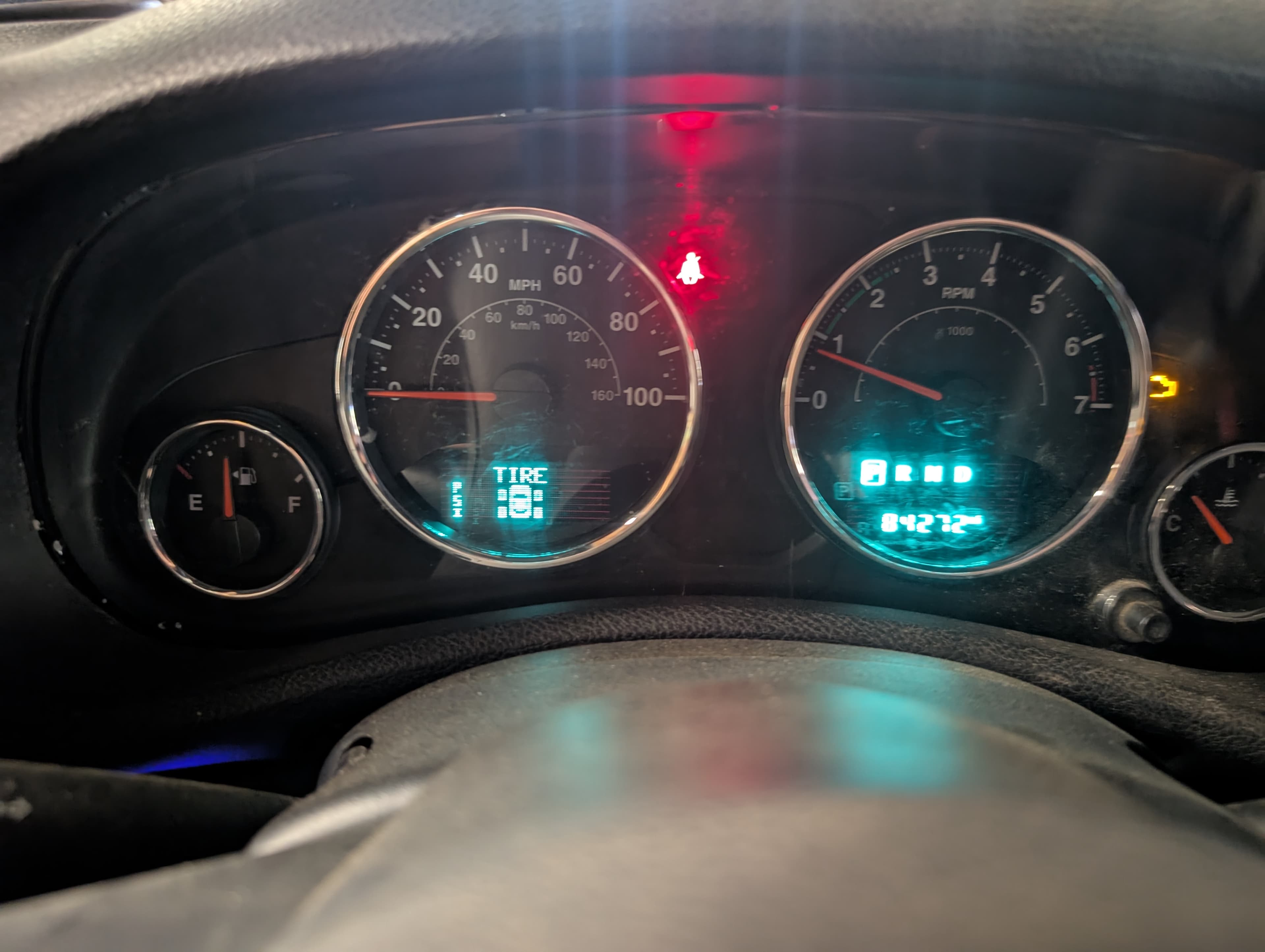 Jeep instrument cluster with TIRE warning light